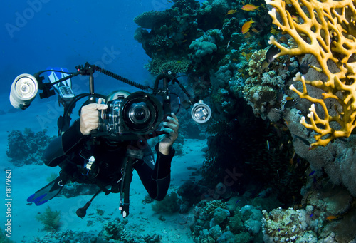 underwater photographer diver with camera