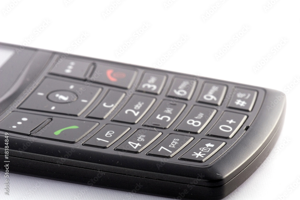 old and obsolete cellphone on white background old and obsolete cellphone on white background