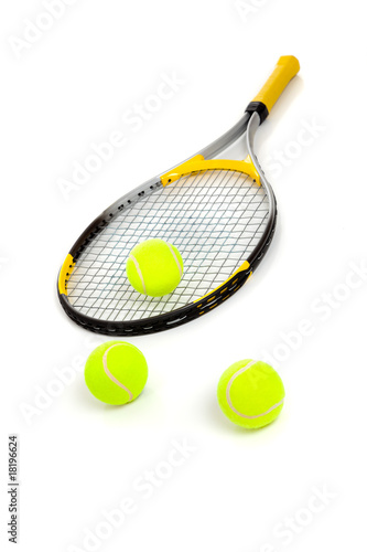 Tennis racket and balls on white © Michael Flippo