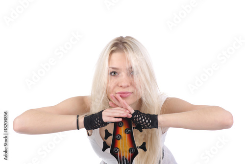 Portrait of blonde girl with electric guitar