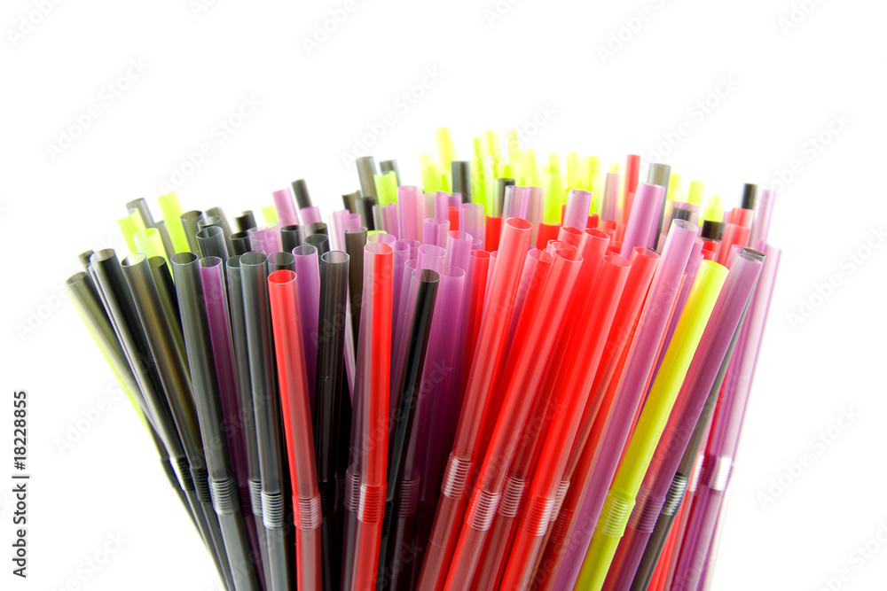 Colorful straws in closeup over white background Colorful straws in closeup over white background