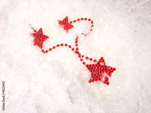 red bright stars in the snow