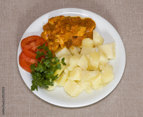 Boiled potatoes with gravy