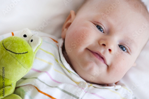 Cute baby boy with toy
