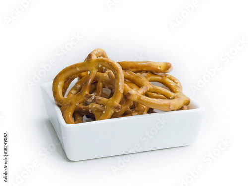 Bild auf Leinwand a small container of hard pretzels