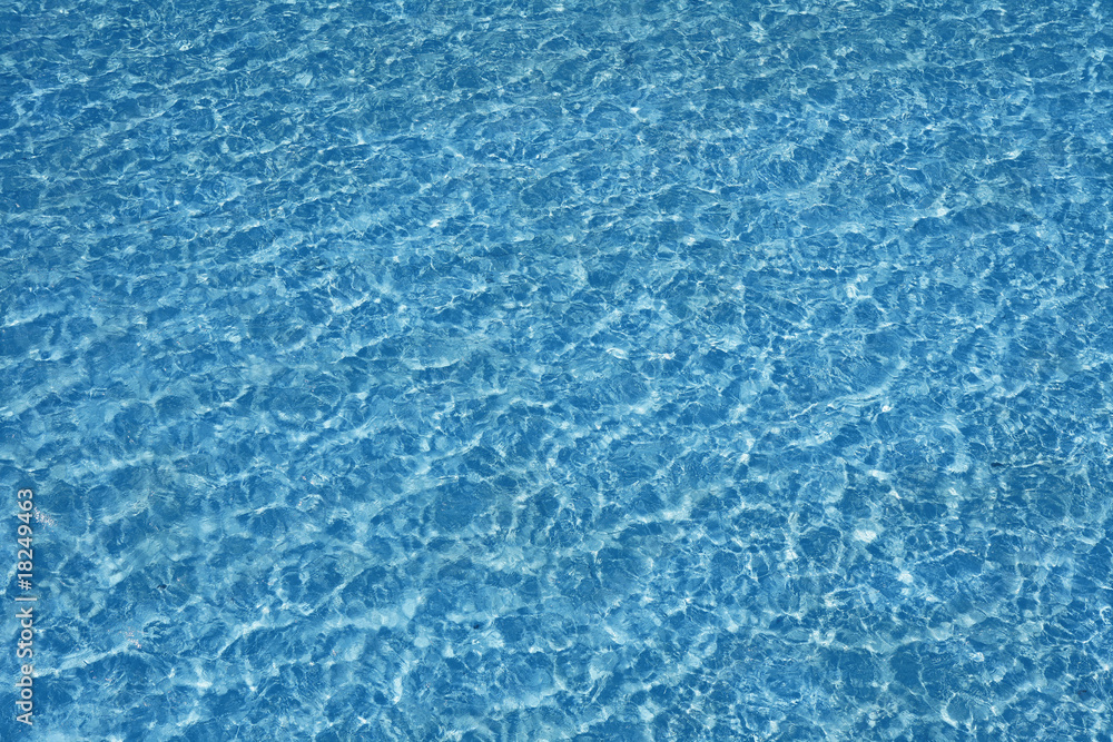 Blue pool water transparent texture reflexion