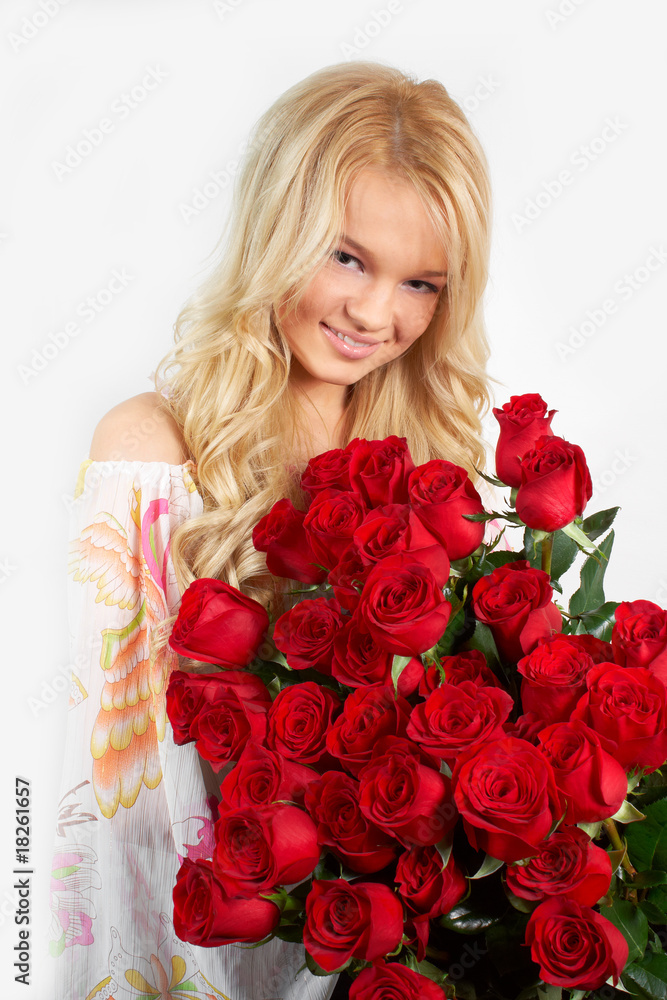 young blonde girl with a bouquet of flowers young blonde girl with a bouquet of flowers