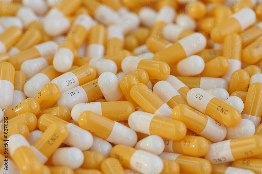 Tabletten gelb-weiss Stock Photo | Adobe Stock