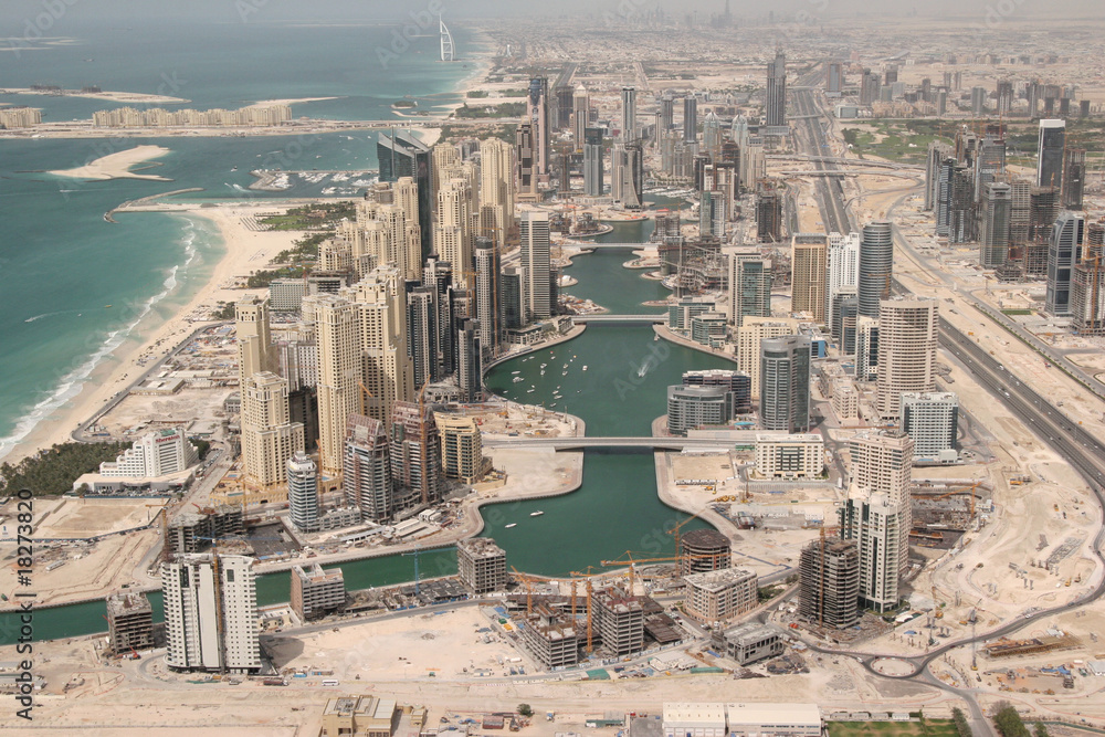 Fototapeta premium Waterfront Construction And Properties In Dubai