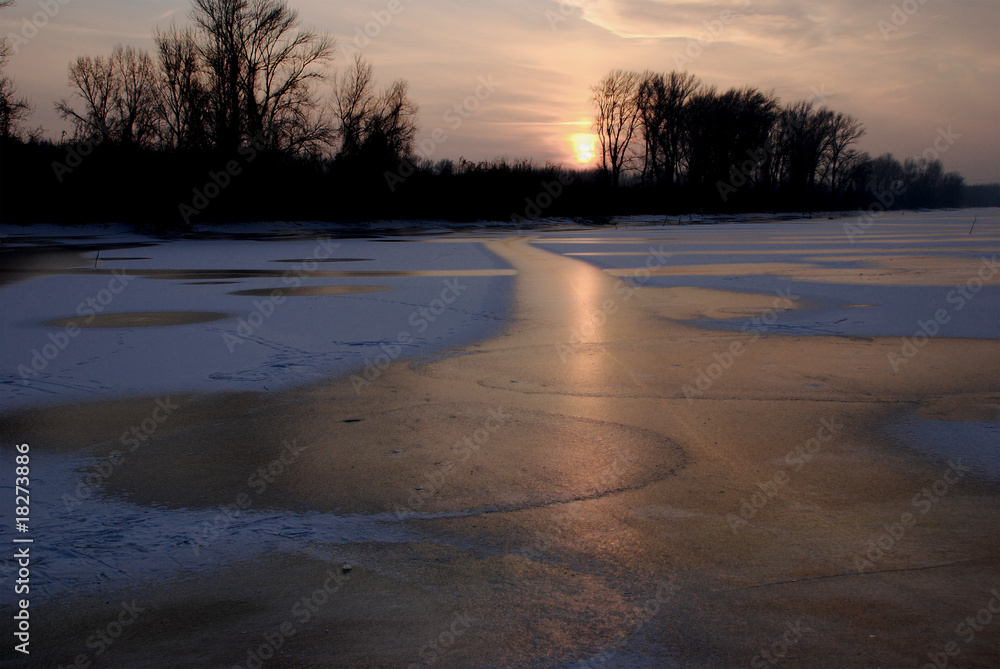 frozen lake in sunset