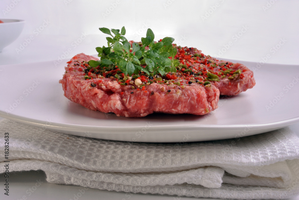 fresh peppered lamb grill steak on a white plate