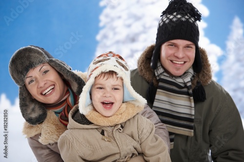Family in snow at winter © nyul