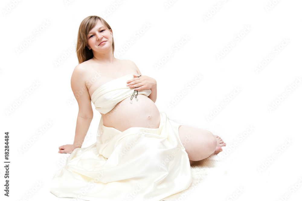 pregnant wooman sit on white isolated background pregnant wooman sit on white isolated background