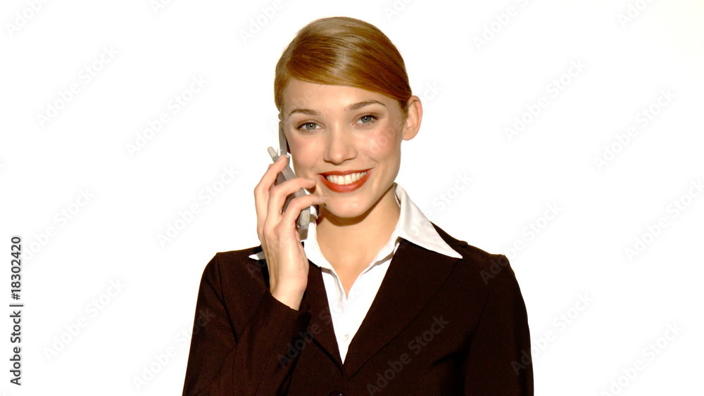 Beautiful young businesswoman is using mobile phone Beautiful young businesswoman is using mobile phone