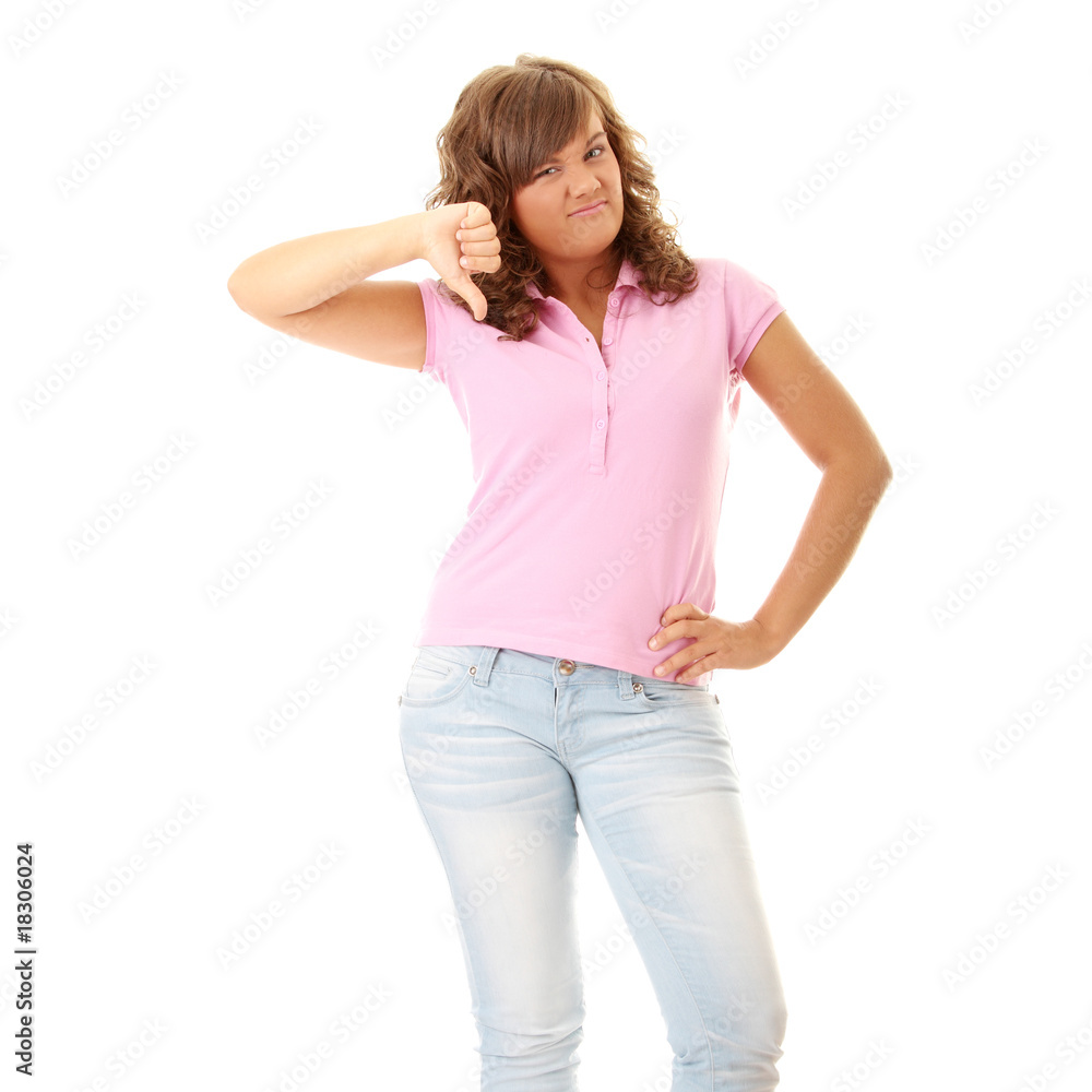 Fototapeta premium Young woman with thumbs down