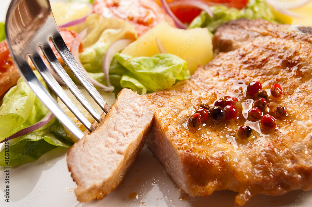 Grilled meat with boiled potatoes and vegetable salad