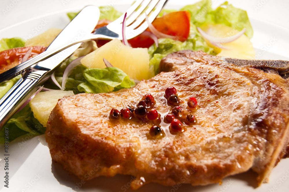 Grilled meat with boiled potatoes and vegetable salad Grilled meat with boiled potatoes and vegetable salad