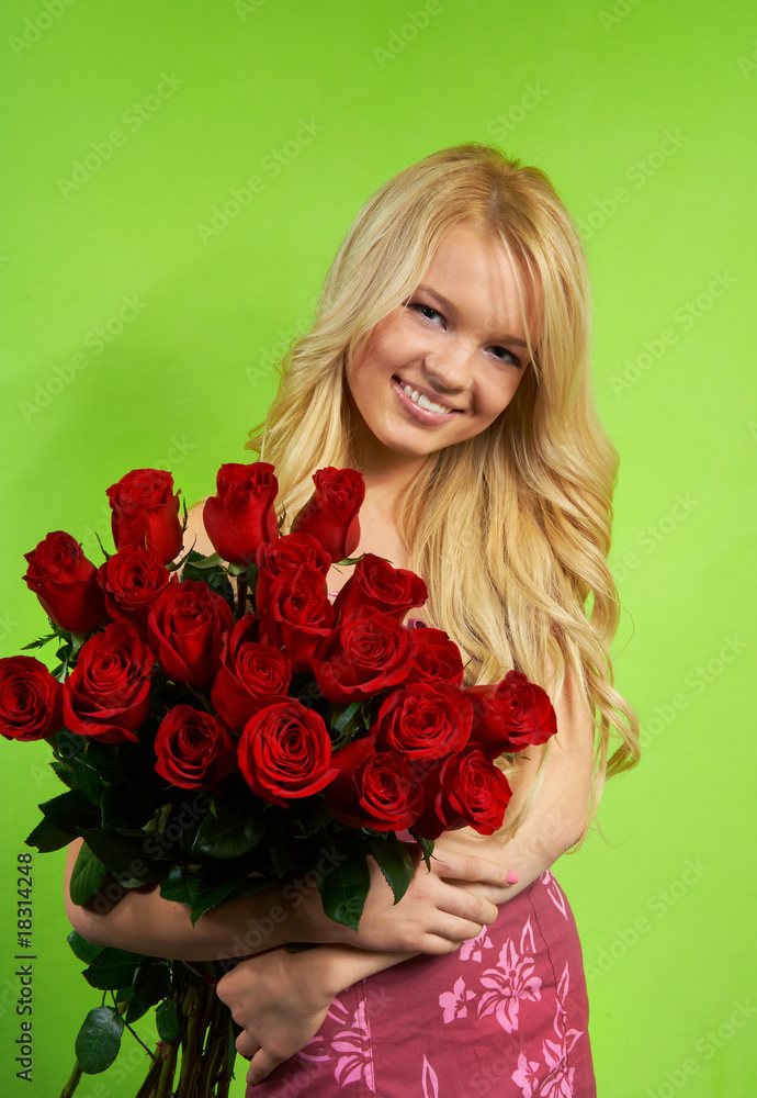 Beautiful young blonde girl with bouquet roses Beautiful young blonde girl with bouquet roses