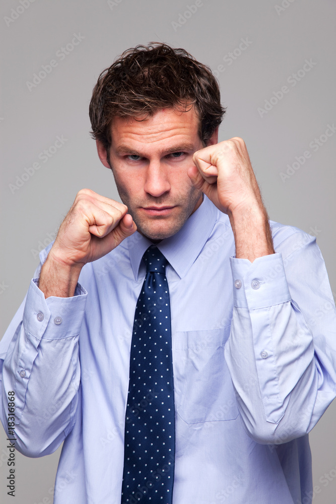 Businessman ready to do battle Businessman ready to do battle