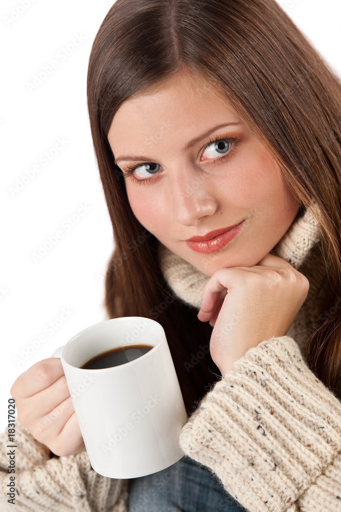 Winter portrait of happy woman holding cup of coffee Winter portrait of happy woman holding cup of coffee