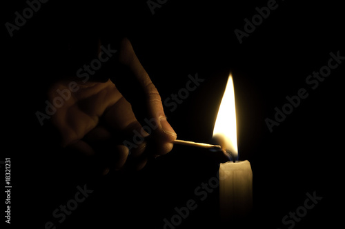 Man is firing a candle