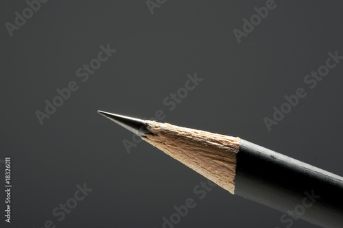 macro pencil against grey background