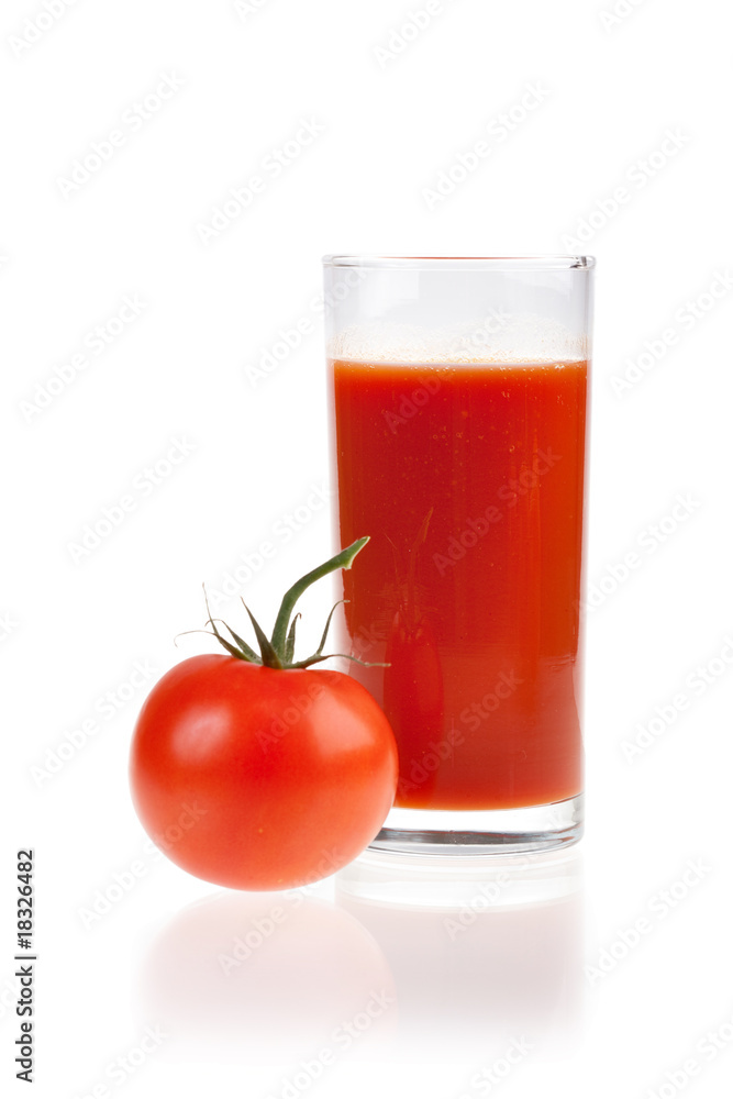 Ripe red tomatoes and glass of tomato juice. Ripe red tomatoes and glass of tomato juice.