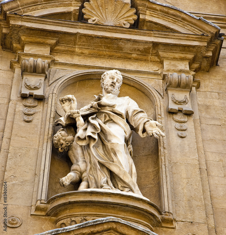 Statue of Priest and Angel