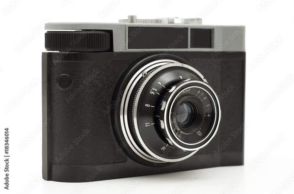 old antique analog photo camera isolated on white