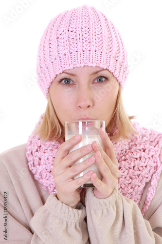 Winter woman drinking milk