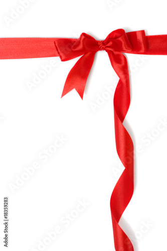 red gift ribbon and bow isolated over white