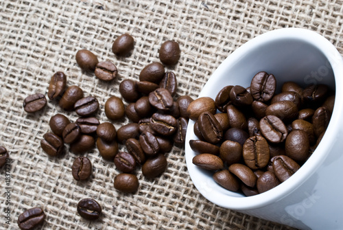 background of burlap and coffee beans photo