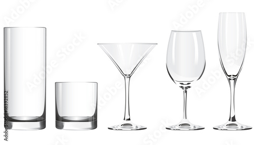 Various glass goblets stand on a white background