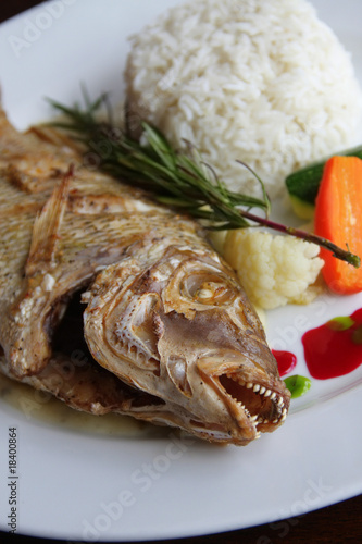 baked exotic fish on dish