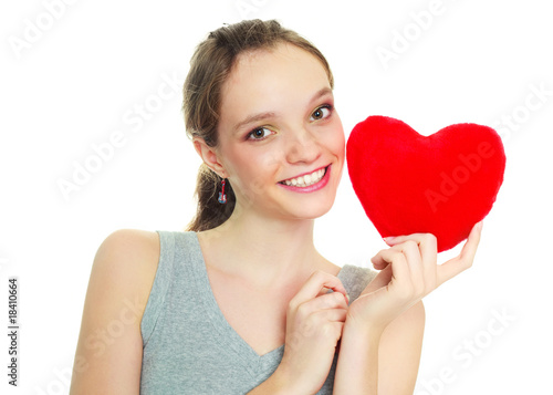 girl with a heart-shaped pillow