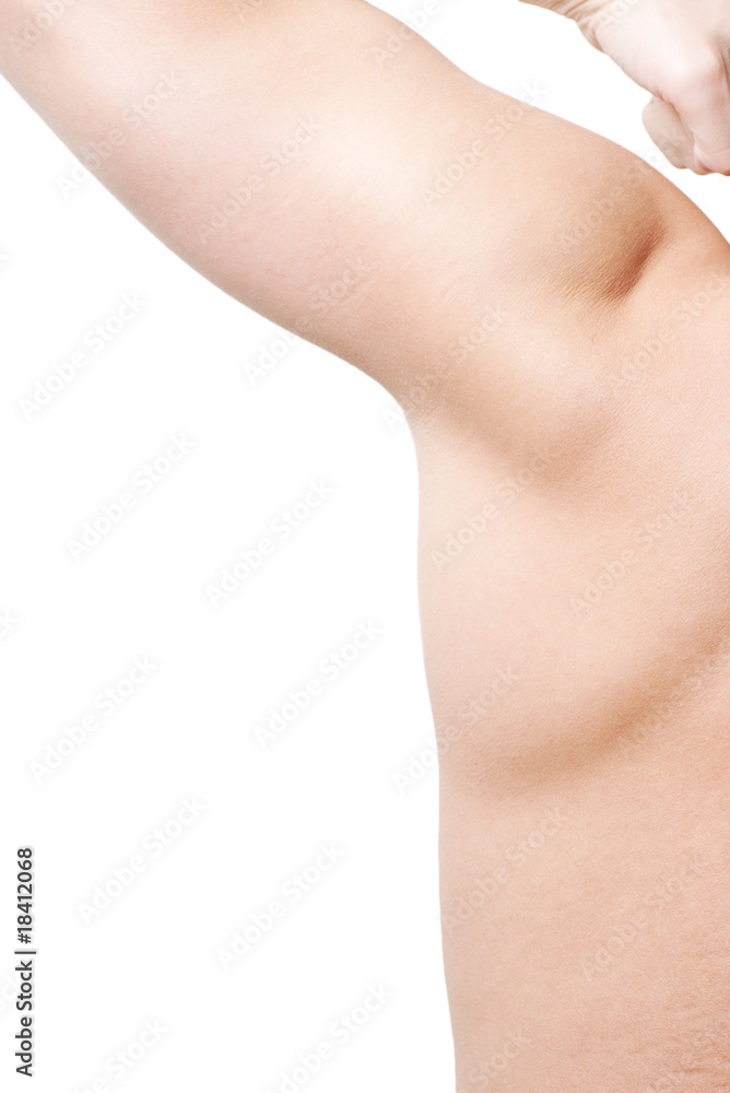 Male armpit viewed from the back on white with selective focus