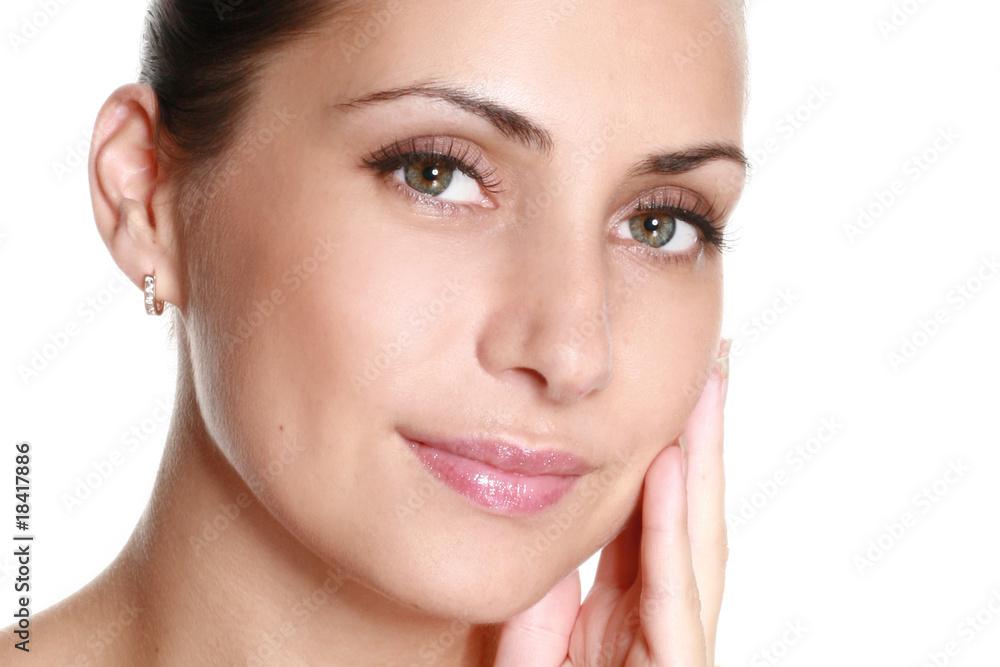 Beautiful young woman face. Close-up.