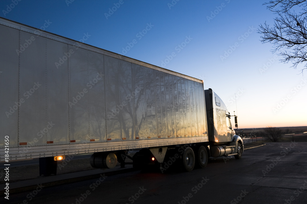 Semi Truck seen at sunrise