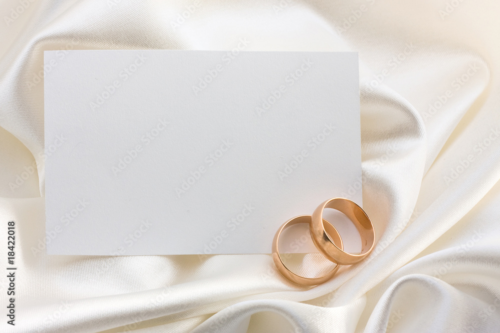 Two wedding rings and card