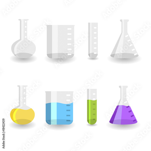 Different chemistry beakers empty and full with colored liquids