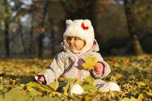 baby with leaves
