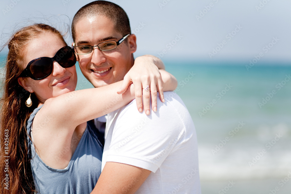Loving couple together at the beach