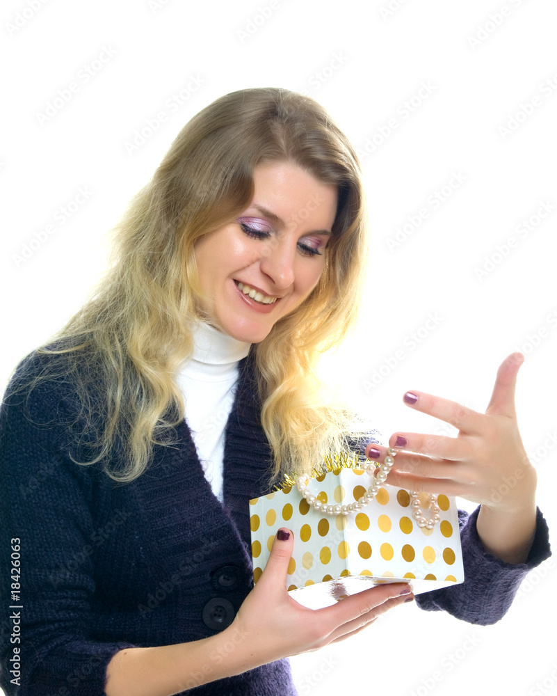Beautiful happy girl with a gift. Isolated on white Beautiful happy girl with a gift. Isolated on white