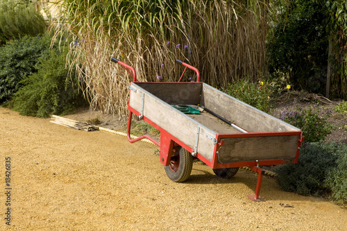 The red handbarrow in the garden photo