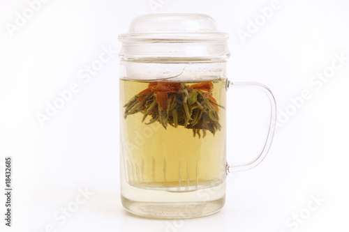 Obraz na płótnie Herbal tea with tea flower in glass cup w salonie