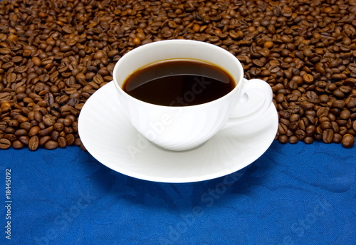 Cup of  coffee on a blue background