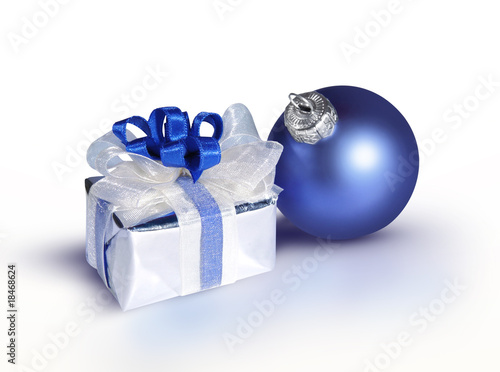 blue bauble and a gift on a white background