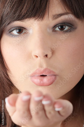 Woman sending a kiss