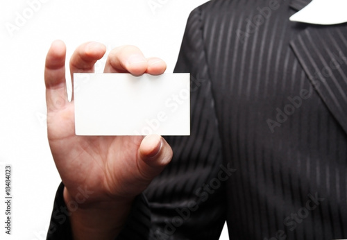 Business man holding blank card
