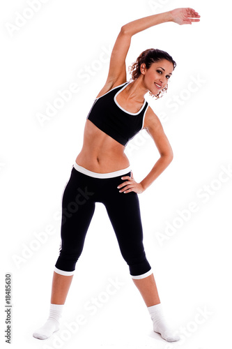 Cute fitness girl stretching her body © get4net
